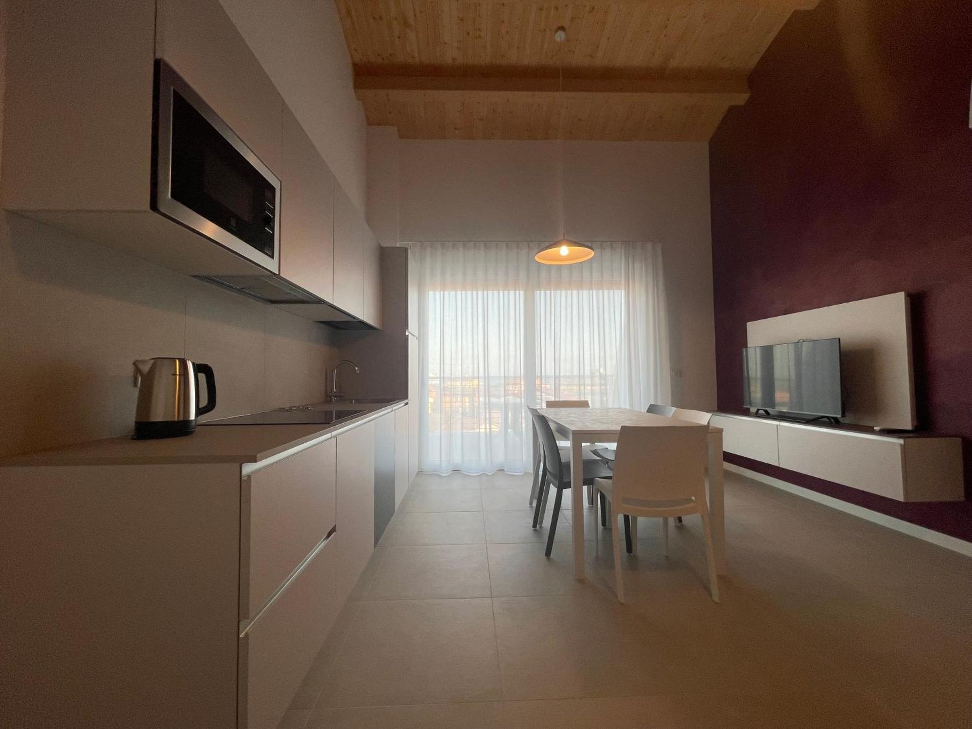 קאורלה Woody Green Penthouse Sea View - Agenzia Cocal מראה חיצוני תמונה